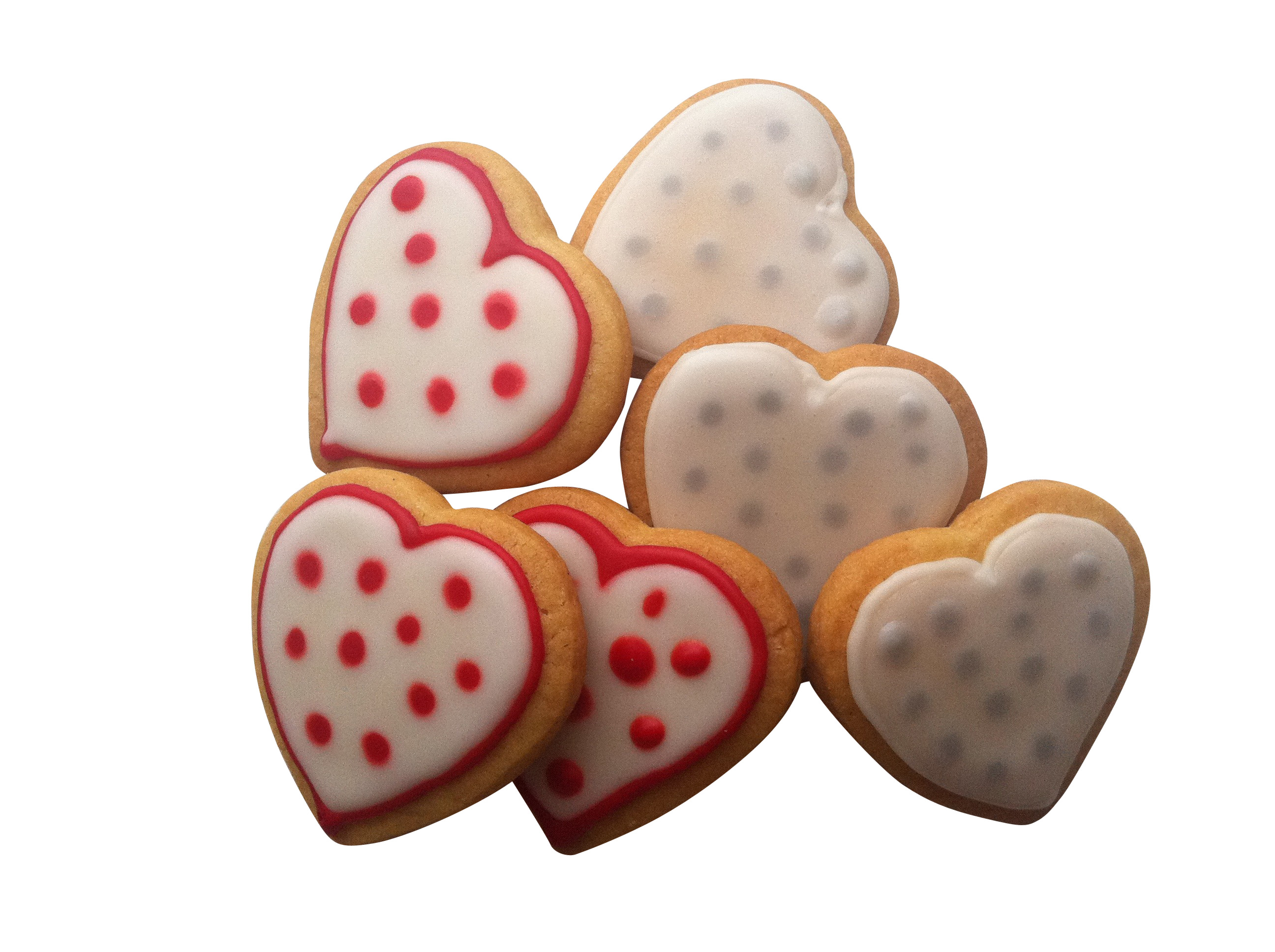흰색 배경 위의 group heart shaped cookies